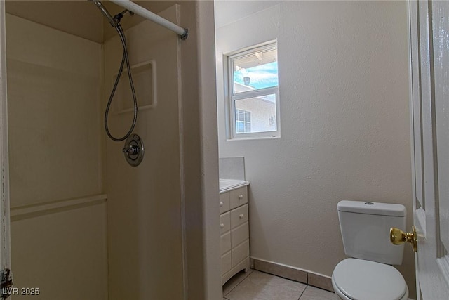 5170 S Pearl St, Las Vegas, NV 89120 - bathroom with a shower, tile patterned floors, toilet, and vanity