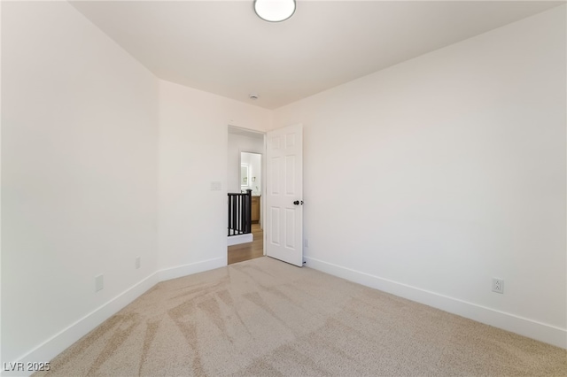 529 Fork Mesa Ct, Henderson, NV 89015 - unfurnished room with light carpet and baseboards