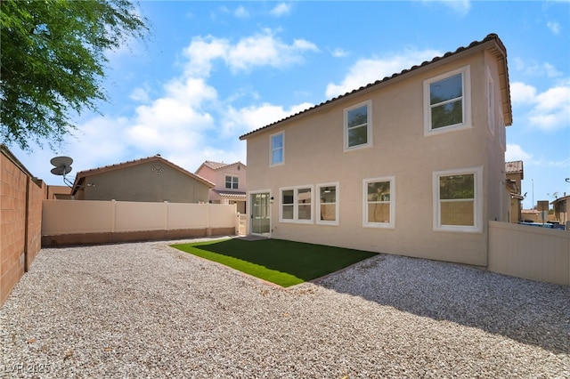 529 Fork Mesa Ct, Henderson, NV 89015 - rear view of property featuring a fenced backyard, stucco siding, and a patio area