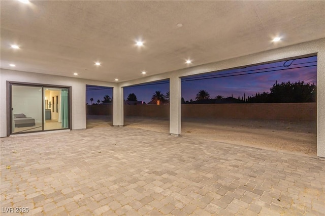 view of patio / terrace featuring fence