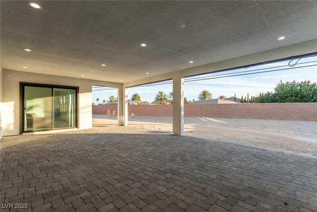 view of patio / terrace featuring fence