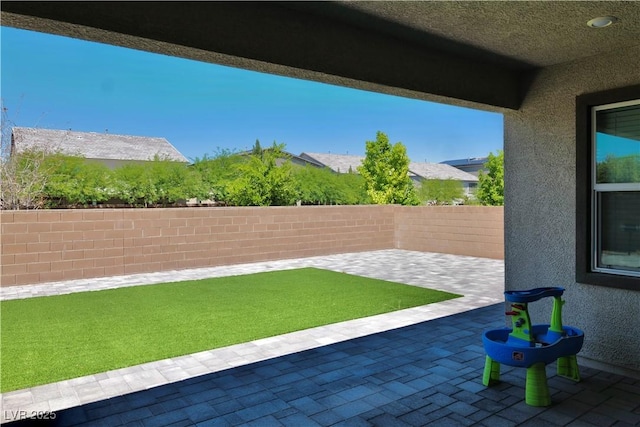 6250 Lamont Hills Ave, Las Vegas, NV 89139 - fenced backyard featuring a patio area