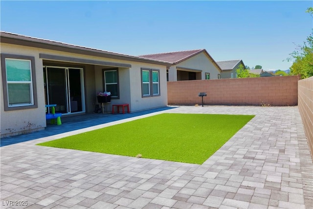 6250 Lamont Hills Ave, Las Vegas, NV 89139 - fenced backyard featuring a patio area