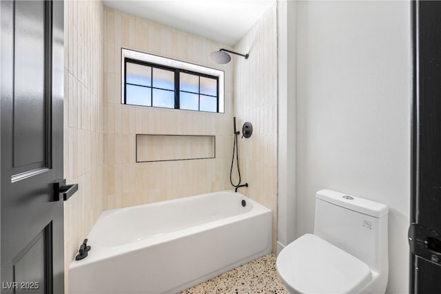full bath featuring toilet, bathing tub / shower combination, and speckled floor
