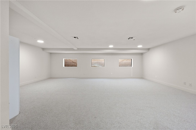 carpeted spare room with recessed lighting, a smoke detector, and baseboards
