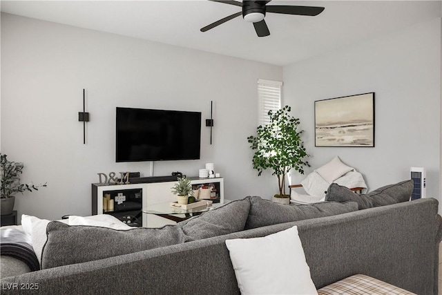 living area featuring ceiling fan