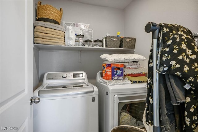 washroom with washing machine and dryer