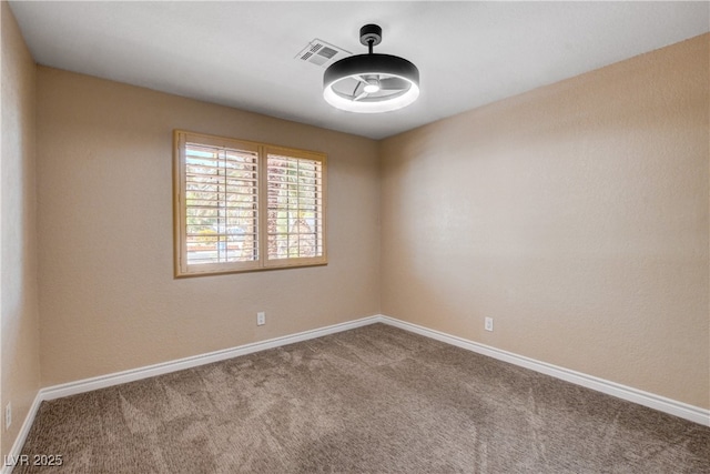6117 Foxcroft Ave, Las Vegas, NV 89108 - carpeted spare room featuring baseboards