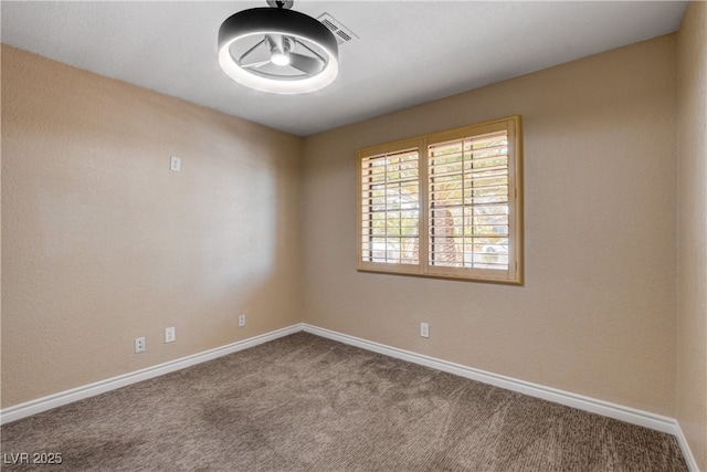 6117 Foxcroft Ave, Las Vegas, NV 89108 - empty room with carpet flooring and baseboards