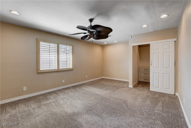 6117 Foxcroft Ave, Las Vegas, NV 89108 - unfurnished bedroom with carpet, baseboards, recessed lighting, a ceiling fan, and a closet