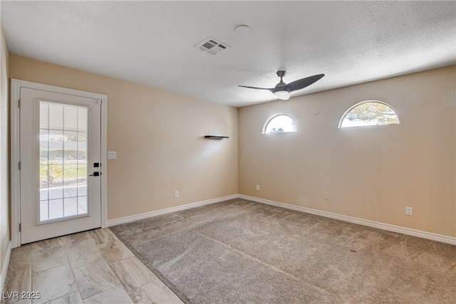 6117 Foxcroft Ave, Las Vegas, NV 89108 - unfurnished room with a ceiling fan, baseboards, and light carpet