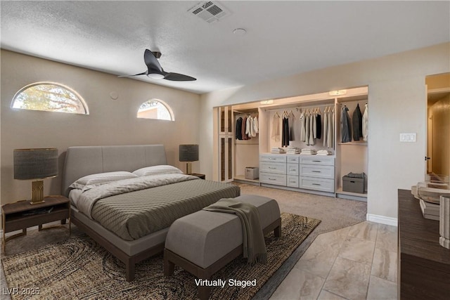 6117 Foxcroft Ave, Las Vegas, NV 89108 - bedroom featuring a closet, a ceiling fan, light marble finish flooring, and baseboards