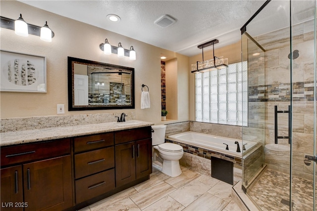 6117 Foxcroft Ave, Las Vegas, NV 89108 - bathroom featuring toilet, a stall shower, a bath, vanity, and a textured ceiling