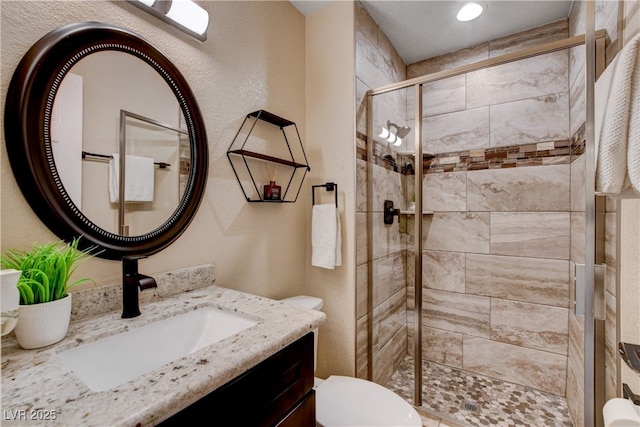 6117 Foxcroft Ave, Las Vegas, NV 89108 - bathroom with a stall shower, toilet, and vanity