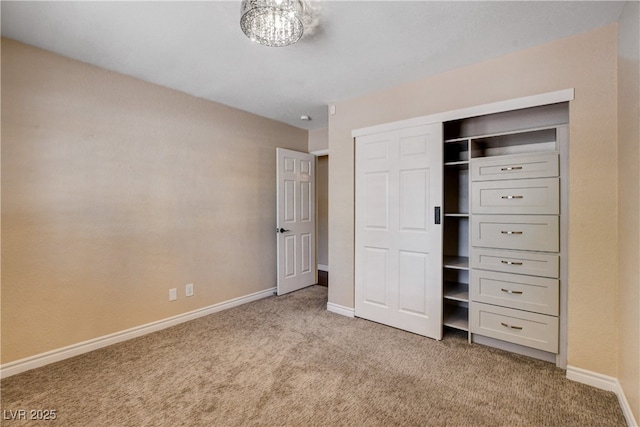 6117 Foxcroft Ave, Las Vegas, NV 89108 - unfurnished bedroom with carpet, baseboards, and a closet