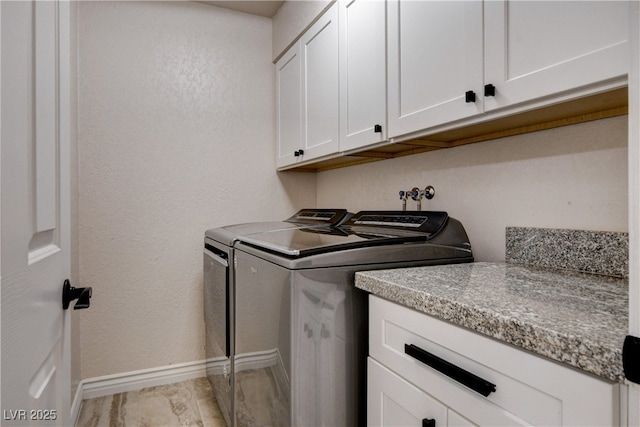 6117 Foxcroft Ave, Las Vegas, NV 89108 - laundry room with independent washer and dryer, cabinet space, and baseboards