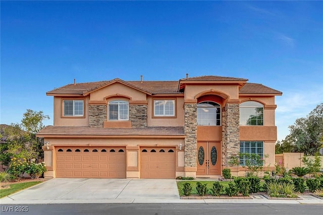 281 Powerbilt Ave, Las Vegas, NV 89148 - view of front of property featuring stucco siding, a garage, stone siding, and driveway