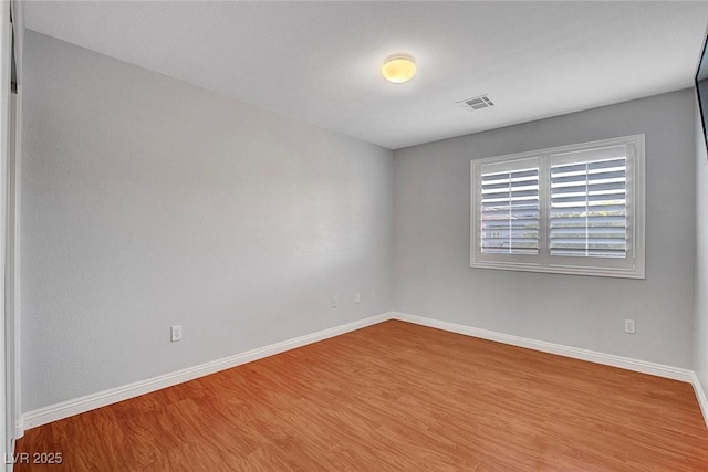 281 Powerbilt Ave, Las Vegas, NV 89148 - unfurnished room featuring wood finished floors and baseboards