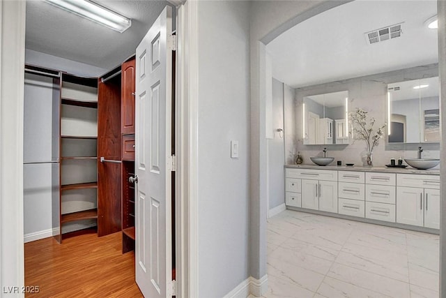 281 Powerbilt Ave, Las Vegas, NV 89148 - full bath with baseboards, double vanity, and marble finish flooring