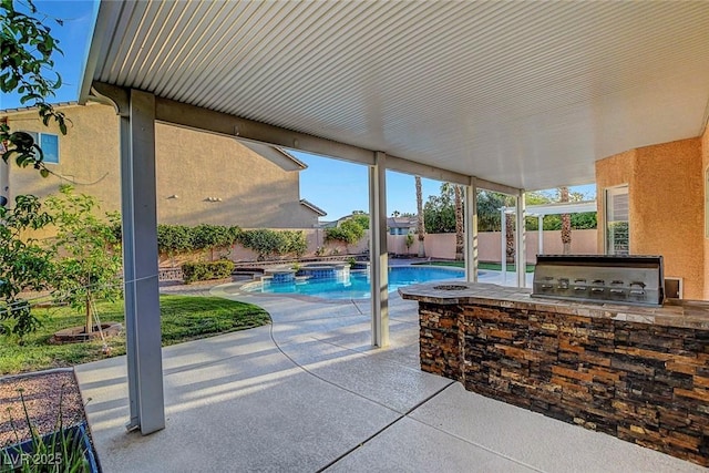281 Powerbilt Ave, Las Vegas, NV 89148 - view of patio / terrace with area for grilling, an outdoor hot tub, and a fenced backyard