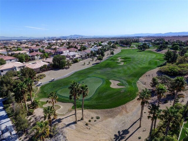 281 Powerbilt Ave, Las Vegas, NV 89148 - aerial view of property and surrounding area featuring nearby suburban area, a golf course, and mountains