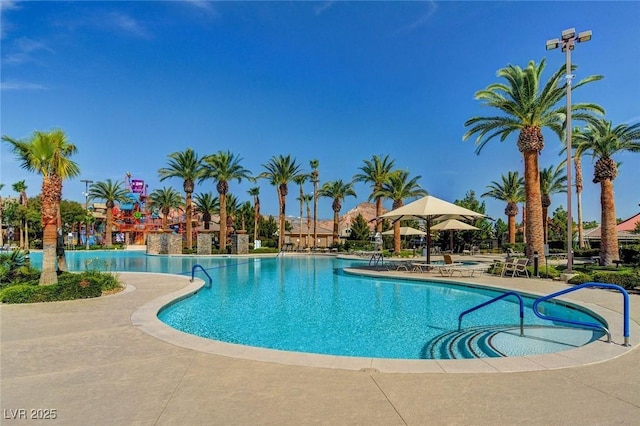 281 Powerbilt Ave, Las Vegas, NV 89148 - community pool with a patio