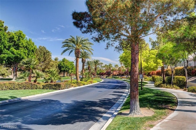 281 Powerbilt Ave, Las Vegas, NV 89148 - view of asphalt street featuring curbs and sidewalks