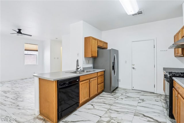 kitchen featuring black appliances, a sink, light marble finish flooring, a ceiling fan, and baseboards