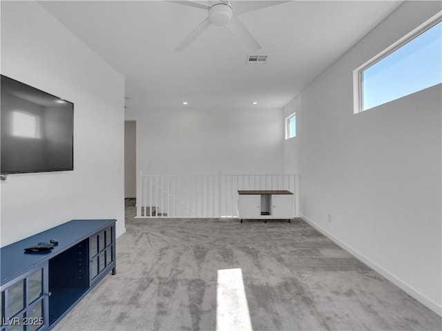 4246 W Landberg Ave, Las Vegas, NV 89141 - unfurnished living room with carpet floors, a ceiling fan, and recessed lighting
