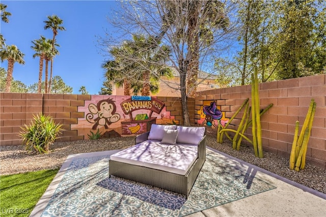 view of patio / terrace featuring fence