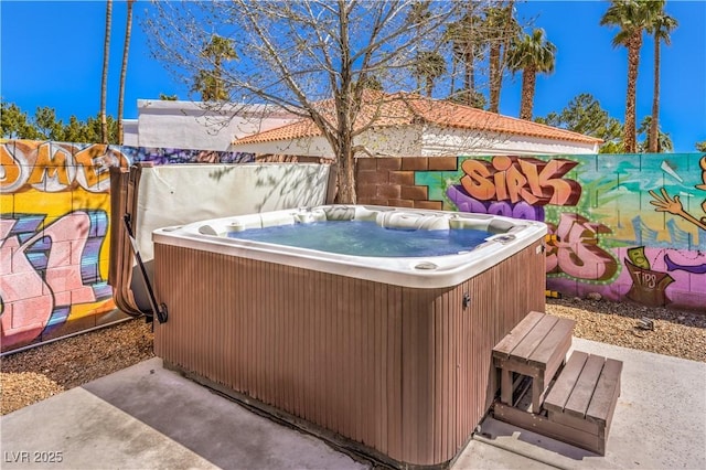 view of patio featuring a hot tub