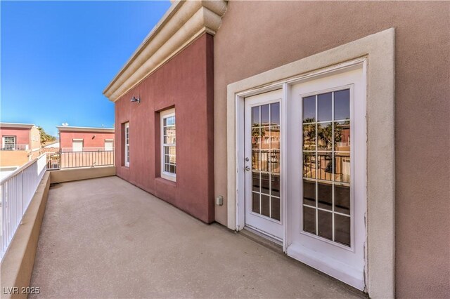 view of home's exterior featuring stucco siding and a balcony
