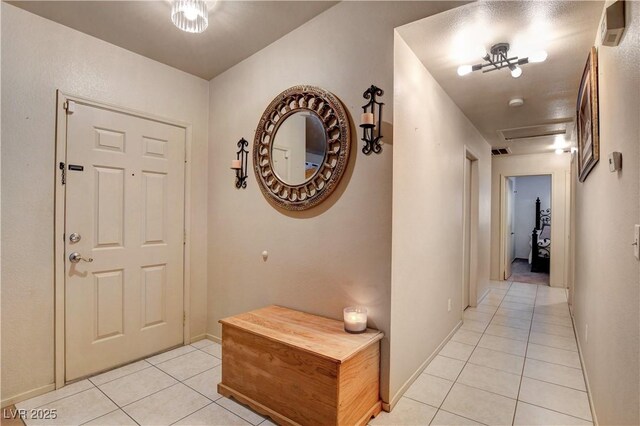5220 Shasta Daisy St, North Las Vegas, NV 89031 - hall with light tile patterned flooring and baseboards