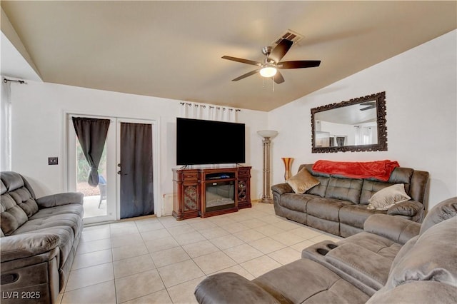 5220 Shasta Daisy St, North Las Vegas, NV 89031 - living area with vaulted ceiling, a ceiling fan, and light tile patterned flooring