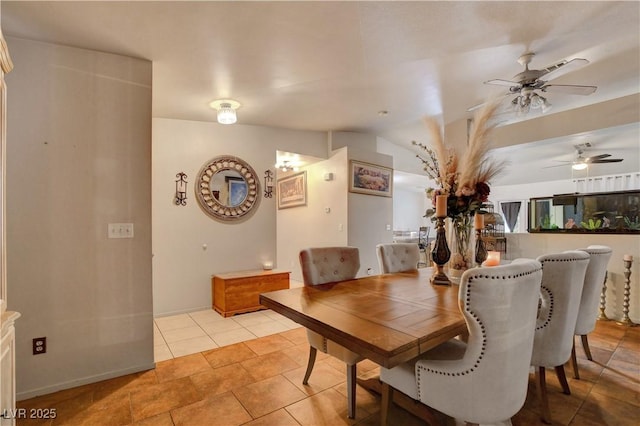 5220 Shasta Daisy St, North Las Vegas, NV 89031 - dining area with a ceiling fan, vaulted ceiling, and light tile patterned flooring