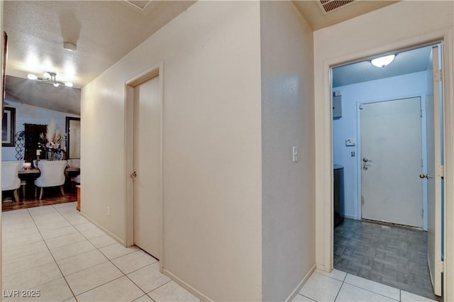 5220 Shasta Daisy St, North Las Vegas, NV 89031 - hall with light tile patterned floors and baseboards