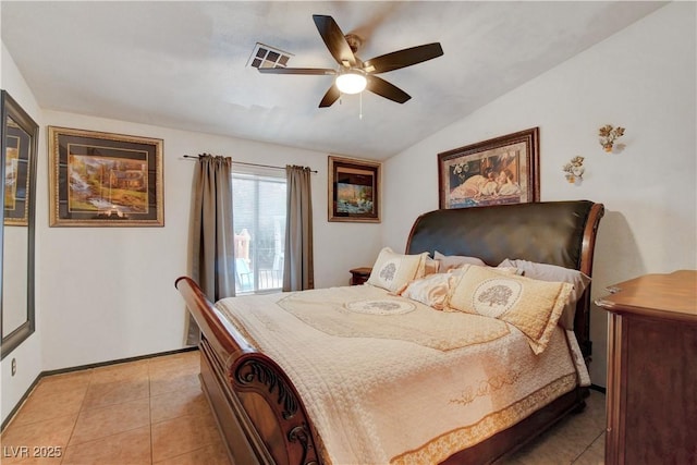 5220 Shasta Daisy St, North Las Vegas, NV 89031 - bedroom featuring vaulted ceiling, baseboards, a ceiling fan, and light tile patterned floors