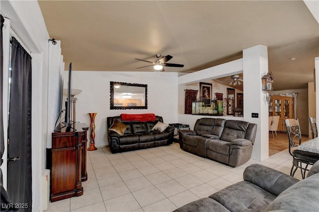 5220 Shasta Daisy St, North Las Vegas, NV 89031 - living area with a ceiling fan and light tile patterned floors