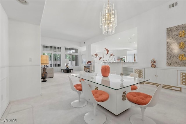 6141 Markleham Ave, Las Vegas, NV 89130 - carpeted dining space featuring a chandelier