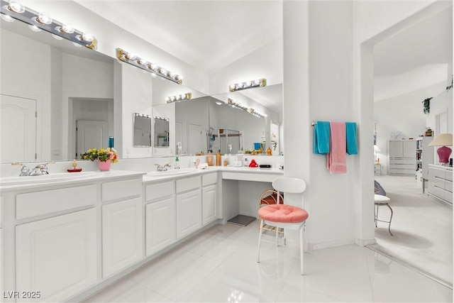 6141 Markleham Ave, Las Vegas, NV 89130 - bathroom featuring double vanity, lofted ceiling, and tile patterned floors