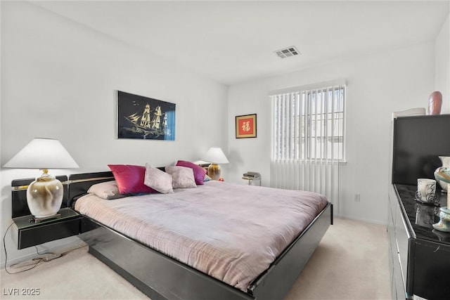 carpeted bedroom with baseboards