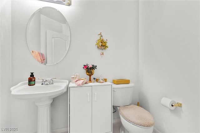 6141 Markleham Ave, Las Vegas, NV 89130 - half bath with toilet and a sink