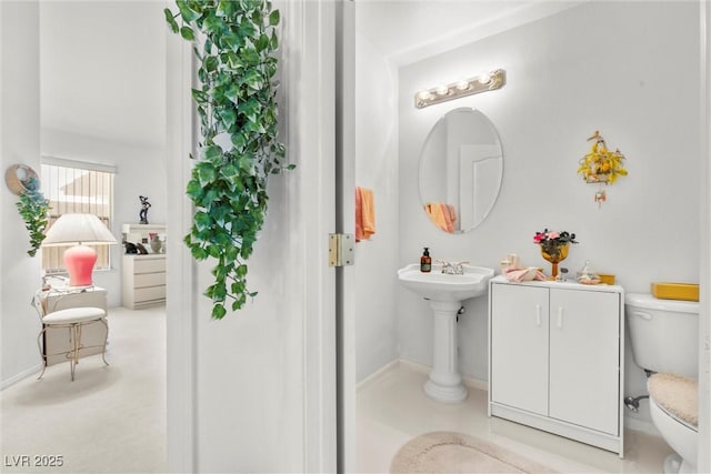 bathroom featuring toilet