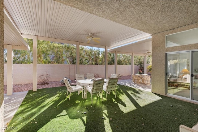 view of patio / terrace featuring ceiling fan and outdoor dining space