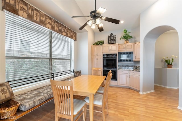 1933 Davina St, Henderson, NV 89074 - dining room featuring light wood-type flooring, ceiling fan, arched walkways, baseboards, and recessed lighting
