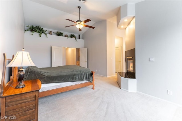 1933 Davina St, Henderson, NV 89074 - bedroom with high vaulted ceiling, carpet flooring, baseboards, and a ceiling fan
