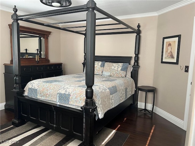 bedroom with baseboards, wood finished floors, and ornamental molding