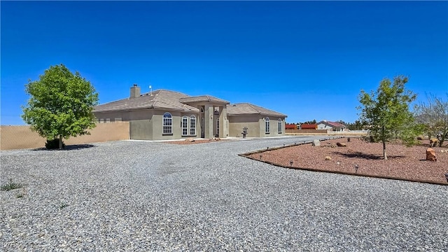 3780 Shawnee Ave, Pahrump, NV 89048 - view of front facade with fence