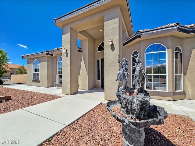 3780 Shawnee Ave, Pahrump, NV 89048 - doorway to property with stucco siding