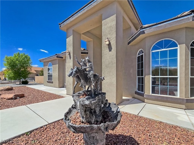 3780 Shawnee Ave, Pahrump, NV 89048 - view of home's exterior with stucco siding